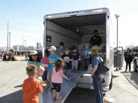30-Kenny_gets_a_cardboard_truck_from_the_U-Haul_truck