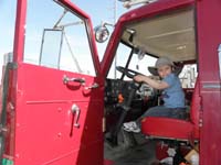 36-Kenny_in_an_old_fashioned_fire_truck
