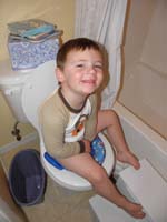20-cute_Kenny_is_a_big_boy_using_the_potty