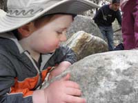 42-Kenny_is_impressed_with_the_bug_on_the_rock