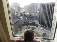 05-Kenny_watches_the_trucks_on_The_Strip-love_the_graffiti_on_the_window