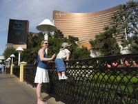39-more_climbing_to_look_at_the_roses_in_front_of_the_Wynn