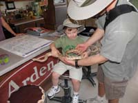 15-Kenny_checks_out_a_frozen_rattlesnake_at_Eldorado_Canyon_Mine_Tour