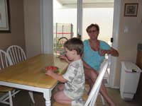 113-up_from_his_nap_eating_watermelon_and_doesn't_notice_the_trampoline_in_the_backyard