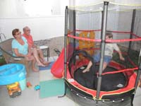 116-Kenny_and_Grandpa_Duke_watch_Kenny_bounce