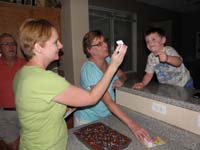 118-putting_candles_on_Kenny's_first_birthday_cake_for_turning_three_years_old