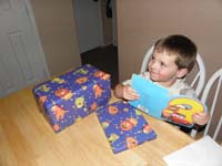122-Kenny_opens_presents