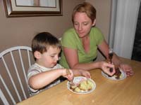125-Kenny_and_Mommy_eating_cake
