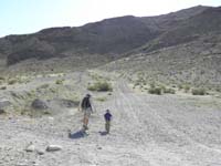06-Daddy_and_Kenny_start_hiking_Lone_Mountain-trail_starts_from_left_to_ridgeline