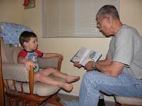 09-Poppy_reads_Kenny_a_night_night_story