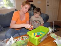 40-Mommy_and_Kenny_play_with_Lego_blocks-from_Leyna_and_Brooke