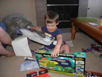 43-next_morning_Kenny_opens_more_presents