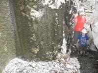 20-Kenny_and_Kim_found_a_mini_waterfall_behind_a_fast_melting_snowbank