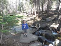 086-Kenny's_very_happy_to_be_hiking-about_to_cross_the_stream