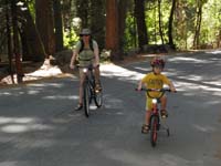 144-Mommy_and_Kenny_riding_bikes_near_Happy_Isles