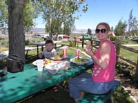 152-Kenny_and_Mommy_having_lunch_outside_Whoa_Nellie_Diner-Mono_Lake_in_background