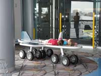 03-Kenny_made_a_friend_in_the_airport_kid's_play_area