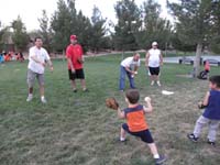 63-trying_to_teach_Kenny_to_step_into_his_throw