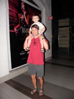 05-Kenny_hitches_a_ride_on_Uncle_Jeff's_shoulders