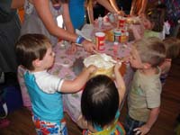 07-Kenny_Beeja_and_Jack_decorating_a_cake