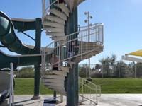 03-Daddy_and_Kenny_racing_up_the_stairs_to_slide_again