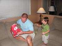 52-Kenny_gives_Uncle_Tommy_a_birthday_present