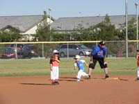 49-Kenny_running_from_second_base_to_third