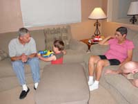 71-Poppy_and_Baba_watch_Kenny_play_at_home