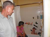 72-Poppy_and_Baba_watch_Kenny_take_a_bath