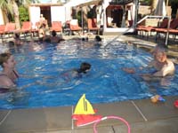 79-Kenny_swimming_from_Mommy_to_Poppy