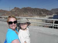 10-Mommy_and_Kenny_on_the_bridge_side_looking_at_Hoover_Dam-cars_won't_be_able_to_see_Dam_over_the_wall
