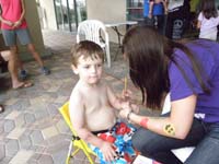 11-Kenny's_getting_an_American_Flag_painted_on_his_arm