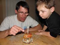 20-Daddy_brought_home_special_treat_from_work_to_share_with_injured_Kenny-caramel_chocolate_covered_apple