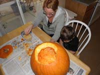 03-Kenny_is_not_a_fan_of_the_pumpkin_guts-he_wouldn't_help_Daddy_clean_out_the_pumpkin