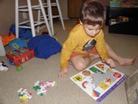 01-Kenny_puts_his_'easy'_puzzle_together_all_by_himself