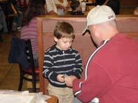 02-Coach_Nick_gives_Kenny_a_trophy