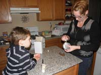 07-glueing_Kenny's_trophy_back_together-he_broke_it_after_about_30_minutes