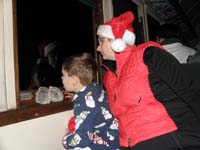 32-Mommy_and_Kenny_looking_for_Santa_to_board_the_train