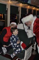 36-Kenny_and_Santa_high_five-from_lady_in_seat_next_to_Daddy