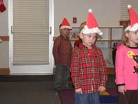 03-Kenny_waiting_to_sing_at_his_Christmas_Sing_program