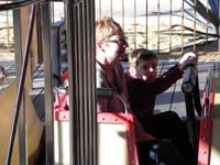 063-Kenny_doesn't_look_so_sure_about_his_first_roller_coaster_ride_with_Mommy