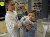 114-Zack_and_Kenny_holding_Manny_the_Manatee-a_gift_from_Cindy