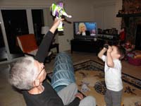 152-Poppy_plays_with_Buzz_Lightyear_while_Kenny_watches_with_his_binoculars