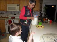 153-getting_cookies_and_milk_ready_for_Santa