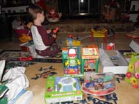 166-Kenny_surrounded_by_his_toys