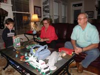 02-Kenny_Grammy_and_Grandpa_Duke_opening_presents_on_Christmas_night