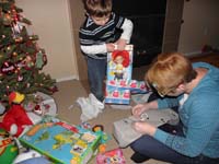 05-Kenny_received_a_lot_of_good_gifts-he_was_very_happy_and_tired