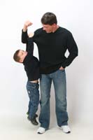 03-Kenny_hanging_from_Daddy's_arm