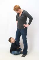 04-Kenny_sitting_on_Mommy's_foot_looking_at_Mommy