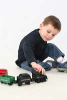 07-Kenny_playing_with_his_train